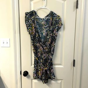 Navy floral romper. From Loft. Size Large. Ruffle sleeve.